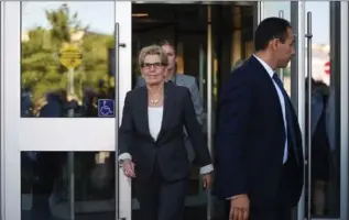  ?? SEAN KILPATRICK, THE CANADIAN PRESS ?? Kathleen Wynne leaves after appearing as a witness in the Election Act bribery trial in Sudbury on Wednesday.