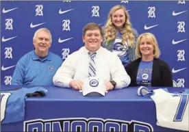  ?? Scott Herpst ?? Steve, Melody and Becky Clinton were among those in attendance to watch Ringgold senior offensive lineman Scott Clinton sign paperwork to play football at Shorter University in nearby Rome.