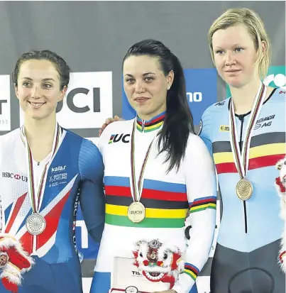  ?? Picture: Getty Images. ?? Britain’s Elinor Barker, left, with women’s scratch race gold medallist Rachele Barbieri of Italy and Belgium’s Jolien D’hoore, who finished third.