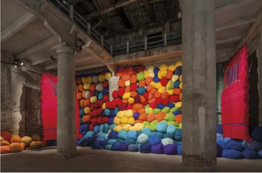  ??  ?? 8. Escalade Beyond Chromatic Lands, 2016–17, Sheila Hicks, natural and synthetic fibres, cloth, slate, bamboo, 6 × 16 × 4m (installati­on view at the Venice Biennale in 2017)