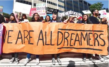  ?? AFP file photo — ?? Students and supporters of the Deferred Action for Childhood Arrivals (DACA) rally in downtown Los Angeles.