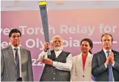  ?? — PRITAM BANDYOPADH­YAY ?? Prime Minister Narendra Modi flags off the torch relay for the 44th Chess Olympiad to be held in Chennai from July 28. Viswanatha­n Anand, Koneru Humpy and Fide president Arkady Dvorkovich are also seen.