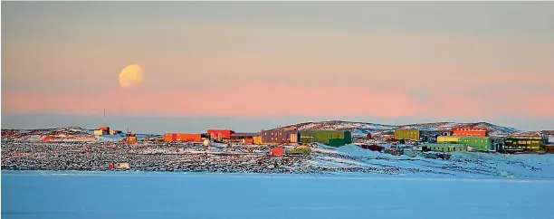  ?? ANTARCTICA.GOV.AU ?? The moon rises over Australia’s Davis base at Antarctica as the icy continent becomes the latest cause in China’s diplomatic clashes with Australia.