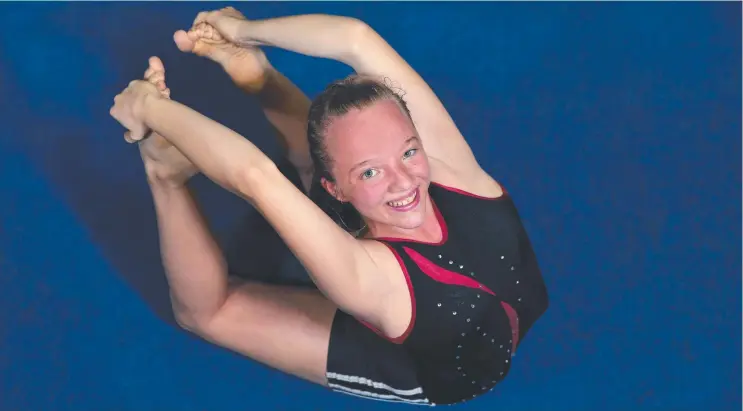  ??  ?? PROUD MOMENT: Gordonvale gymnast Phillipa Beckham, 14, from South Cairns Gymnastics has been chosen as a Commonweal­th Games baton bearer. Picture: ANNA ROGERS