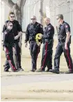  ?? LYLE ASPINALL/FILES ?? Police work at Stanley Park in Calgary on March 20, 2016, after an officer fired two shots at a man carrying a replica handgun.