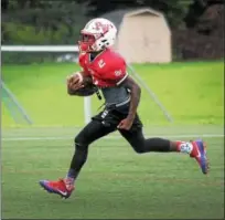  ?? GENE WALSH — DIGITAL FIRST MEDIA ?? Plymouth Whitemarsh’s Dontae Wilson runs the ball at practice.