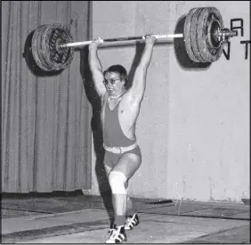  ?? SubmITTeD ?? Rick Smith, at age 21 in 1977, setting a new clean and jerk record at Hants East Rural High School.