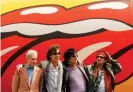  ?? Honda/AFP/Getty Images ?? With the Rolling Stones in 2002. (L to R) Charlie Watts, Mick Jagger, Ronnie Wood, and Keith Richards. Photograph: Stan