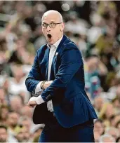  ?? David J. Phillip/Associated Press ?? UConn head coach Dan Hurley reacts during the first half of the NCAA college basketball game against Alabama at the Final Four on Saturday in Glendale, Ariz.