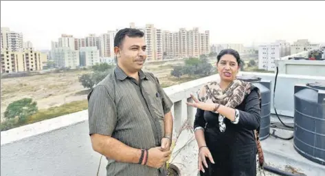  ?? AMAL KS/HT PHOTOS ?? ■ Pratap Chauhan and his wife Rekha Rani lead an isolated life on their fifth floor DDA flat in Narela’s Sector G2. (Right) Like Pratap, Santosh too is one of the two occupants in an apartment block that has 100 flats in Sector A.