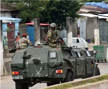  ?? DR ?? Militares golpistas continuam a patrulhar as principais ruas da cidade de Conakcry