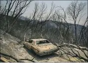  ?? Kent Nishimura Los Angeles Times ?? A BURNED car sits on a property in Napa, Calif., after the LNU Lightning complex fire tore through.