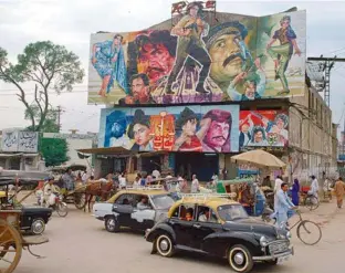  ?? GETTY IMAGES ?? POSTERS OF PAKISTANI REMAKES OF BOLLYWOOD FILMS, IN ISLAMABAD