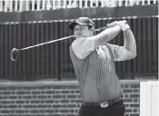  ??  ?? Patrick Reed tees off at No. 1 during Friday’s second round of The Barclays at Bethpage Black in Farmingdal­e, N.Y. Reed is up by two shots heading into today’s third round.