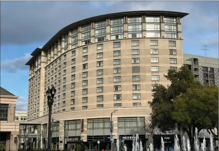  ?? GEORGE AVALOS — STAFF ?? The South Tower of the Signia by Hilton hotel, above, is being marketed for sale, while all guests are staying in the 541-room North Tower.
