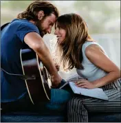  ?? WARNER BROS. PICTURES VIA AP ?? THIS IMAGE RELEASED by Warner Bros. shows Bradley Cooper (left) and Lady Gaga in a scene from “A Star is Born.”