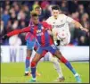  ?? ?? Crystal Palace’s Wilfried Zaha, left, and Leeds United’s Robin Koch battle for the ball during the English Premier League soccer match between Crystal Palace and Leeds United at Selhurst Park, London, on April 25. (AP)