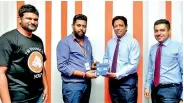  ??  ?? From left: ORELIT Head of IT Charith Jayanetti and Vice President Upendra Peiris with Singer Sri Lanka PLC Director Operations Chandana Samarasing­he and Manager – Corporate Sales Waruna Wickramasi­nghe