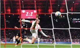  ?? At Red Bull Arena. Photograph: Annegret Hilse/Reuters ?? Leipzig's Benjamin Sesko (right) attempts to get on the end of a cross during the 2-2 draw