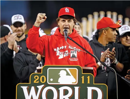  ?? JEFF ROBERSON/AP ?? La Russa speaks at a victory celebratio­n in honor of the Cardinals’ 11th World Series title. Three days after winning, he announced his retirement at 67.