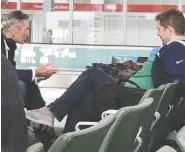  ?? THE CANADIAN PRESS ?? Conservati­ve Leader Andrew Scheer, right, and Manitoba Premier Brian Pallister not wearing masks at Toronto’s Pearson Airport.