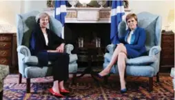  ?? ANDREW MILLIGAN/AFP/GETTY IMAGES ?? Scottish First Minister Nicola Sturgeon, right, is seeking ways for Scotland to remain as part of the European Union even if other parts of the United Kingdom withdraw.