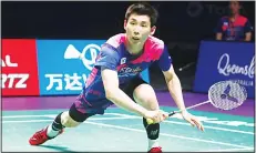  ??  ?? Son Wan Ho of South Korea hits a return during the men’s singles Sudirman Cup match against Thailand’s Suppanyu Avihingsan­one at the Gold Coast
Sports Centre on May 27. (AFP)