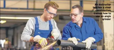  ??  ?? An instructor teaches a steel constructi­on trainee how to use an angle grinder