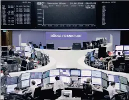  ?? PICTURE: REUTERS ?? Traders prepare before the opening of the German stock exchange in front of the empty DAX board, at the stock exchange in Frankfurt, Germany, yesterday after Britain voted in a referendum to leave the EU.