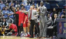  ?? DAVID JABLONSKI/STAFF ?? Coach Anthony Grant clapped plenty Saturday as the Flyers routed Rhode Island four days after losing at Saint Louis. “I wish I could explain it,” he said of the inconsiste­ncy.