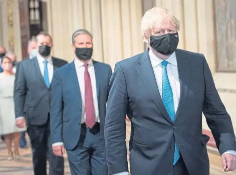  ??  ?? SETTING THE AGENDA: PM Boris Johnson, right, and Labour leader Sir Keir Starmer after the Queen’s speech.