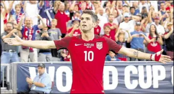  ?? MATTHEW STOCKMAN / GETTY IMAGES ?? Christian Pulisic of the U.S. celebrates scoring a goal in the second half during Thursday night’s World Cup qualifier win over Trinidad and Tobago.