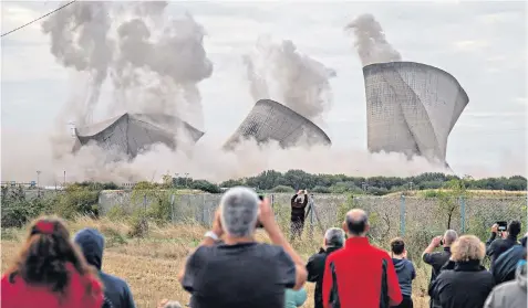  ??  ?? The demolition of the Didcot cooling towers caused debris to hit power lines near the site, said SSEN, resulting in a blackout that affected up to 49,000 homes