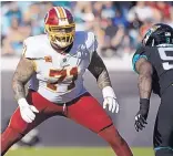  ??  ?? Washington left tackle Trent Williams (71) returned to the Redskins after a long holdout.