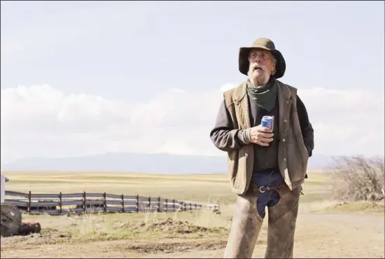  ??  ?? In this photo taken March 20, 2020, cattle rancher Mike Filbin stands on his property in Dufur, Ore, after herding some cows and talks about the impact the new coronaviru­s is having on his rural community. Tiny towns tucked into Oregon’s windswept plains and cattle ranches miles from anywhere in South Dakota might not have had a single case of the new coronaviru­s yet, but their residents fear the spread of the disease to areas with scarce medical resources, the social isolation that comes when the only diner in town closes its doors and the economic free fall that’s
already hitting them hard. (AP)