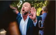  ?? Sergio Flores / For Hearst Connect Media ?? Alex Jones speaks to the media outside the 459th Civil District Court on Aug. 2 in Austin, Texas.