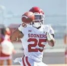  ?? KEVIN JAIRAJ/USA TODAY SPORTS ?? OU running back Jaden Knowles catches a pass during this year's spring game in Norman.