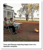 ??  ?? Tony and Denyse enjoying happy hour at a lakeside campsite.