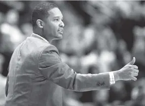  ?? STAFF FILE PHOTO BY ROBIN RUDD ?? UTC men’s basketball coach Lamont Paris is preparing for his second season as coach of the Mocs. Depth was a problem in 2017-18, but he is optimistic offseason additions will offer a solution.