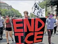  ?? Reuters ?? Anti-ICE protesters at a rally in Washington.