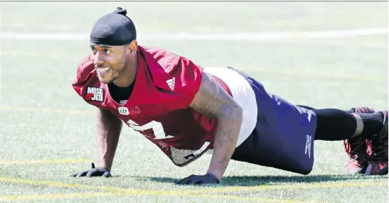  ?? JOHN MAHONEY ?? For football players like Montreal Alouettes defensive back Joe Burnett, pushups are necessary to help build strength and endurance for game-day performanc­e.