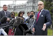  ?? AP/EVAN VUCCI ?? Larry Kudlow, chief economic adviser to President Donald Trump, talks to reporters Friday outside the White House after the release of the August jobs report.