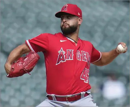  ?? PAUL SANCYA — THE ASSOCIATED PRESS ?? Left-handed pitcher Patrick Sandoval believes there is a start of something new this season for the Angels, who opened spring training Tuesday.