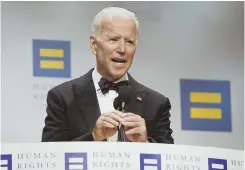  ?? AP FILE PHOTO ?? THIRD TIME’S NO CHARM: Joe Biden, above, speaks at the Human Rights Campaign National Dinner, where he referred to some Trump voters as ‘the dregs of society.’