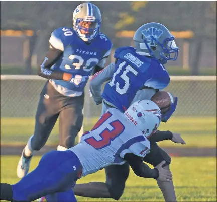  ?? PHOTO BY DAVID DALTON — FOR MEDIANEWS GROUP ?? Warren Woods-Tower’s Mickus Simmons runs for a touchdown against Cousino in the first quarter of Friday night’s season-opener. That score erased a 3-0 Cousino lead.