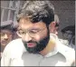  ?? AFP ?? Omar Sheikh comes out of a Karachi court.