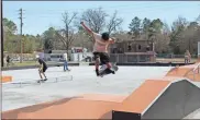  ?? Olivia Morley, File ?? In this March 2022 file photo, a skateboard­er practices on the pyramid at the new Bob Moore Kickflip skate park at Etowah Park.