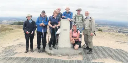  ??  ?? The high point of the day at the summit of The Wrekin