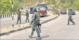  ?? ANI ?? Security personnel cordon off an area after a suspected IED was recovered from Sidra area of Jammu on April 28.