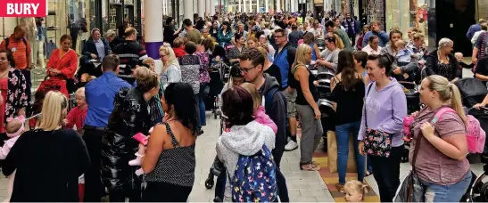  ??  ?? Absolutely stuffed: Dozens of families wait outside Build-A-Bear Worskshop’s branch at The Rock shopping centre yesterday